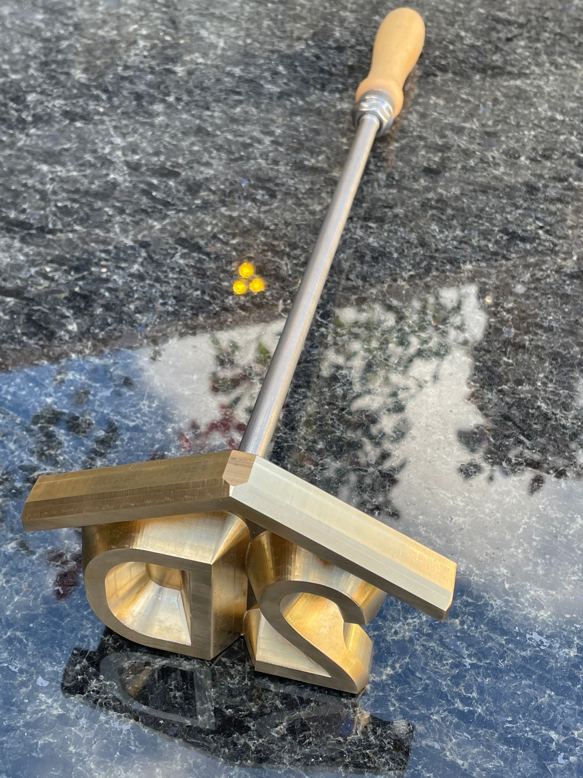 Customer woodworking project marked with a custom branding iron